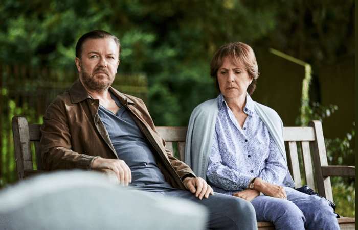 Ricky Gervais, After Life (Netflix) Ricky Gervais and Penelope Wilton sit on a park bench.