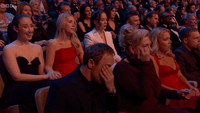 Stephen Graham and Hannah Walters cry in the audience of the Baftas