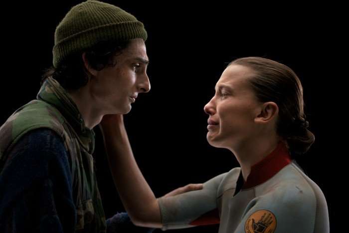 Finn Wolfhard as Mike Wheeler and Millie Bobby Brown as Eleven in Stranger Things