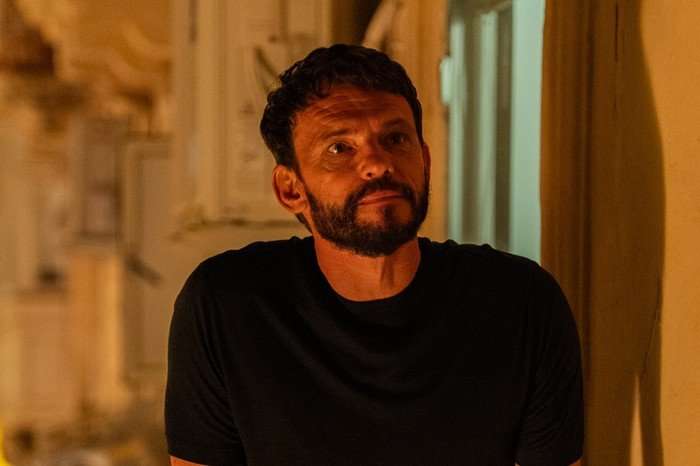 The Assassin S2 A man with a beard looking concerned.