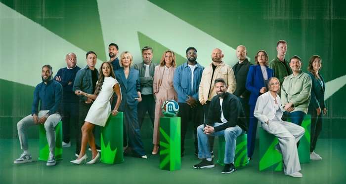 The BBC's FIFA World Cup 2026 presenters and experts line-up Ashley Williams, Benni McCarthy, Scott Brown, Alex Scott, Gaël Clichy, Kelly Cates, Mark Chapman, Gabby Logan, Micah Richards, Wayne Rooney, Olivier Giroud, Alan Shearer, Ellen White, Steph Houghton, Joe Hart, Steve Crossman and Rachel Corsie standing or sitting in a row, in front of a green background.