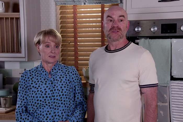 Sally and Tim stood in their kitchen in Coronation Street