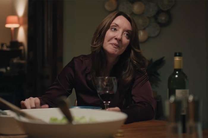 Elizabeth Berrington stars in Tip Toe; in this scene, Stephanie is sat at a dinner table, talking severely about something