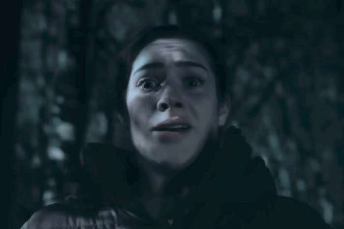 Victoria Sugden looks stunned in a darkened woodland in a scene from Corriedale.