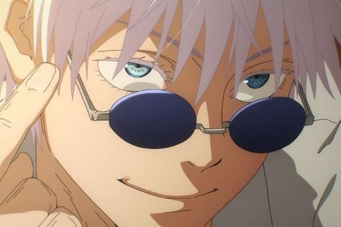 Gojo in Jujutsu Kaisen with sunglasses resting on nose