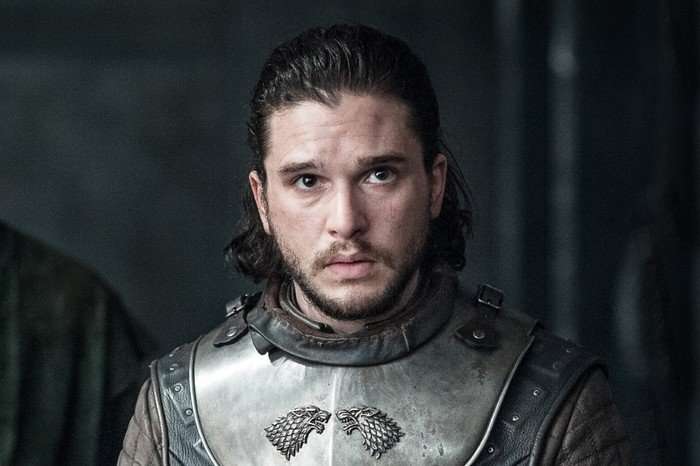 Close-up shot of Kit Harington as Jon Snow in Game of Thrones wearing armour and looking ahead.