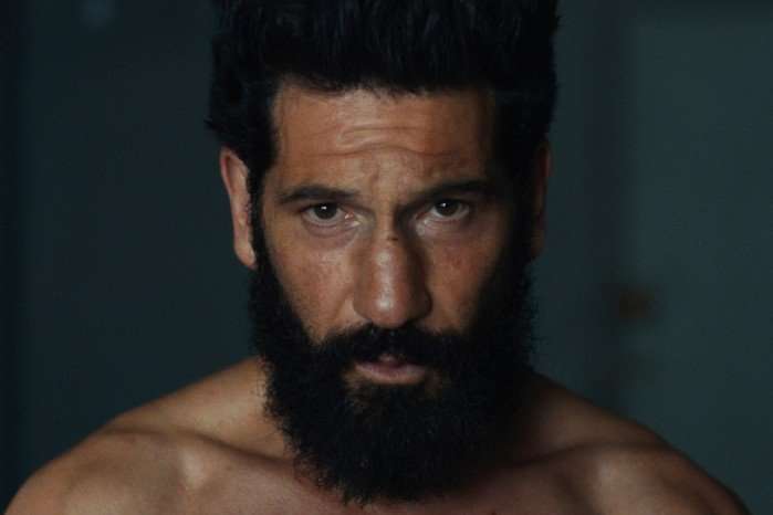 A close-up of Frank Castle (Jon Bernthal) in The Punisher: One Last Kill