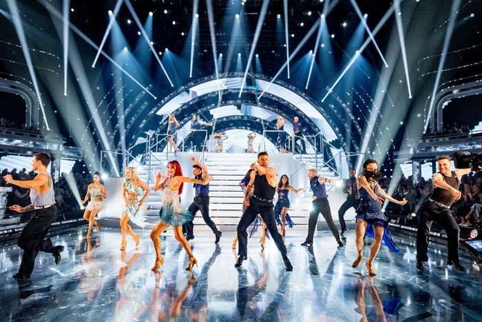 The Strictly Come Dancing 2025 professionals performing on the dance floor.