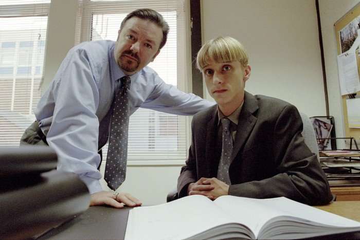 THE OFFICE David Brent (Ricky Gervais) and Gareth Keenan (MacKenzie Crook) in The Office.