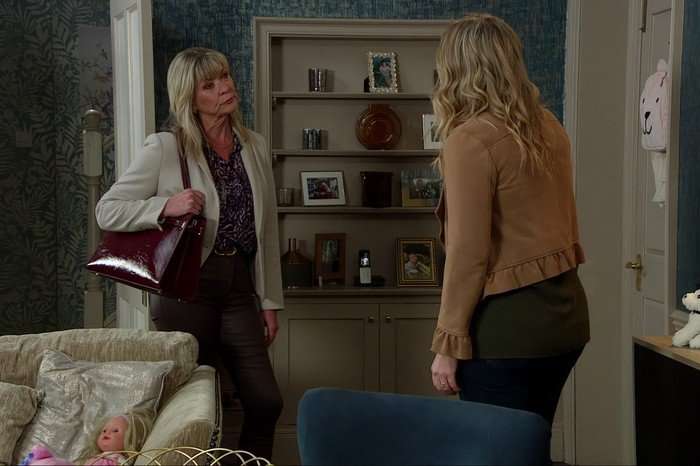 Kim talks to Charity in The Woolpack back room in Emmerdale
