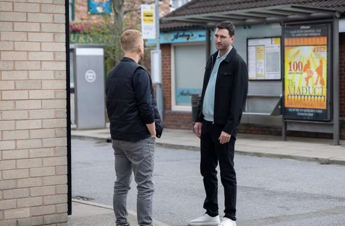 Kit talks to Gary in the street in Coronation Street