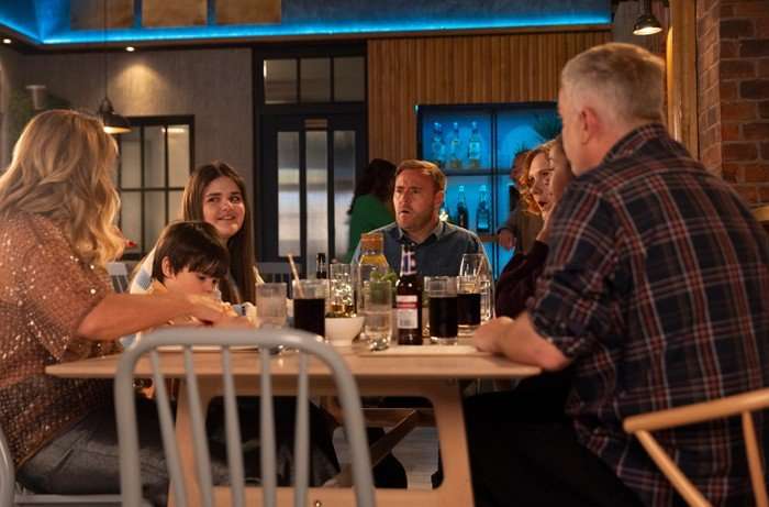 10_07_coro_cassie_ross_03 The Dobbs family and Steve look shocked as Hope smiles in a scene from Coronation Street