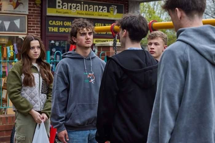 15_06_coro_betsy_brody_dylan_04 A group of lads approach Brody, Betsy and Dylan in Coronation Street