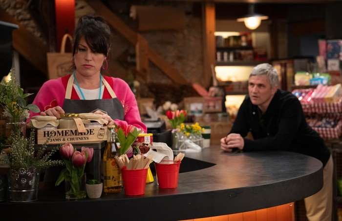 25_06_emm_kerry_caleb_01 Caleb confronts Kerry in the shop in a scene from Emmerdale