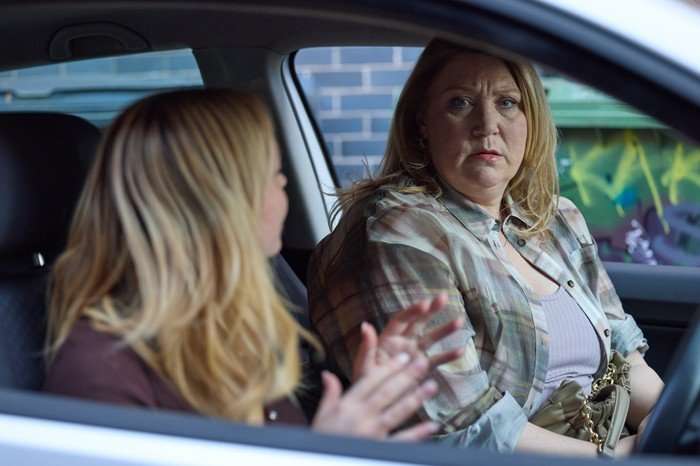 Megan chats to Janine in a car in a scene from Coronation Street