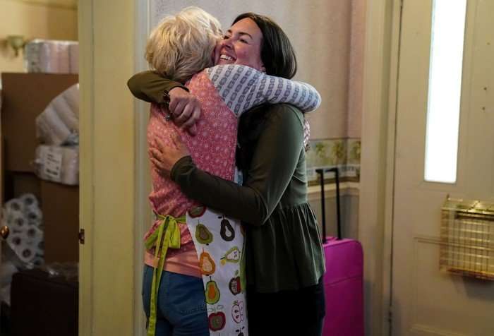 Jean hugs Stacey in a scene from EastEnders
