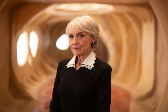 Doctor Who S2 Anita Dobson as Mrs Flood in Doctor Who in a black and white outfit