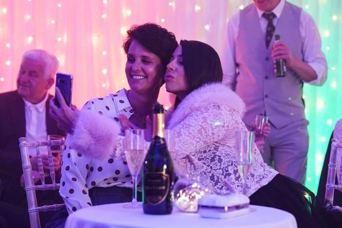Priya and Eve take a selfie in EastEnders