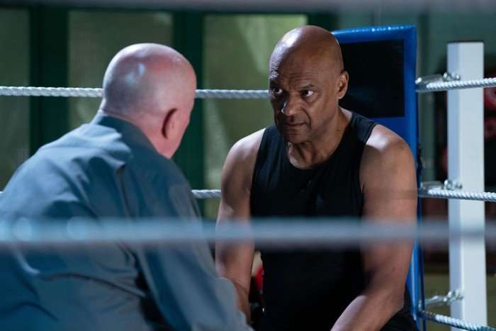 564094,TITLE:Eastenders George and Phil have a conversation in The Boxing Den in EastEnders