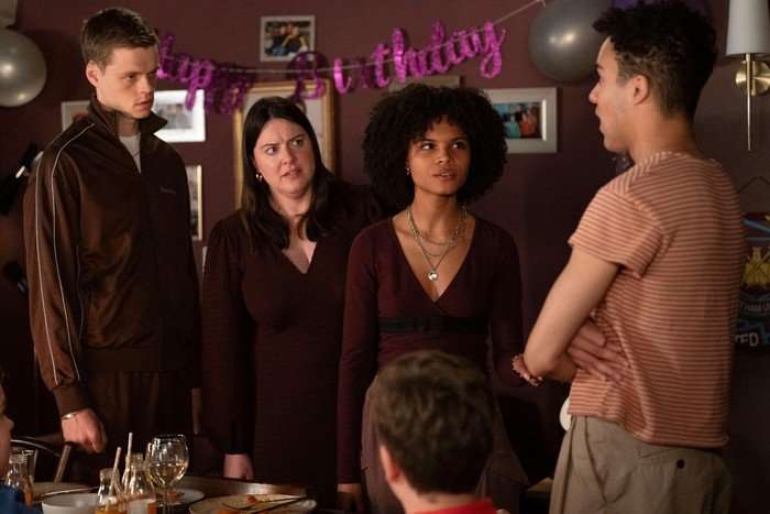 564120,TITLE:Eastenders Oscar, Zoe and Jasmine stare towards Josh in a scene from EastEnders