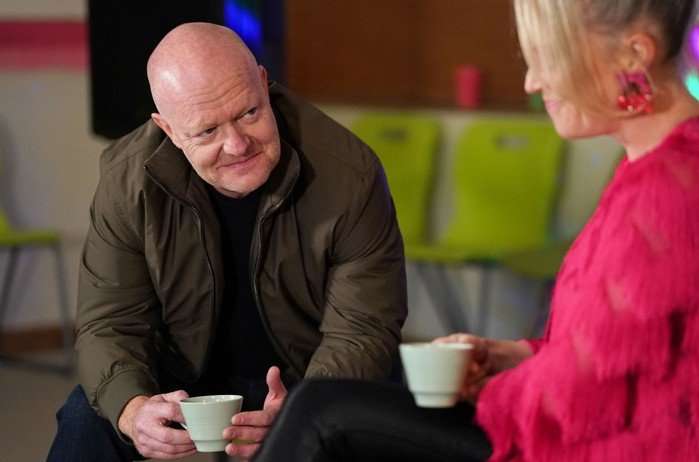 564831,TITLE:Eastenders Max smiles in Linda's direction in a scene from EastEnders