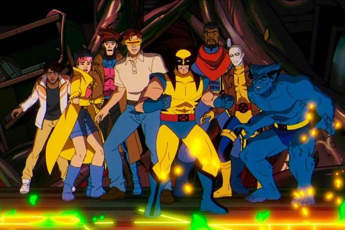 X Men 97 Roberto Da Costa (voiced by Gui Agustini), Jubilee (voiced by Holly Chou), Gambit (voiced by AJ LoCascio), Cyclops (voiced by Ray Chase), Wolverine (voiced by Cal Dodd), Bishop (voiced by Isaac Robinson-Smith), Morph (voiced by JP Karliak) and Beast (voiced by George Buza) in X-Men '97, looking shocked at something offscreen