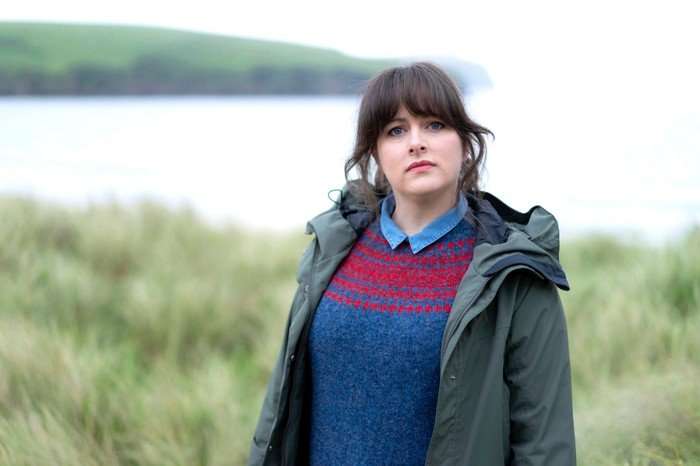 Shetland Alison O'Donnell plays Alison ''Tosh'' McIntosh, standing near the sea, looking directly into the camera