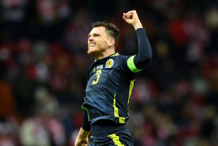 Andy Robertson celebrates scoring Scotland's winner against Poland