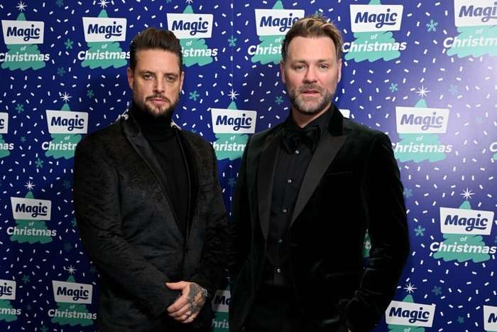 Keith Duffy and Brian McFadden of Boyzlife attend the Magic of Christmas 2024 at London Palladium on November 16, 2024 in London, England.