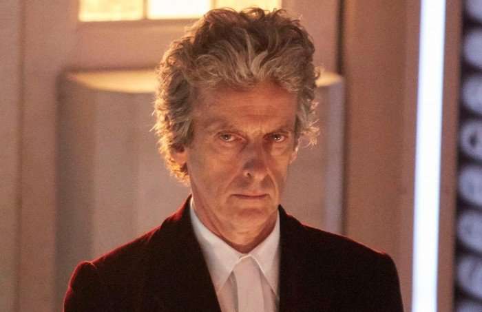 Peter Capaldi in Doctor Who, stood inside the TARDIS by the doors.
