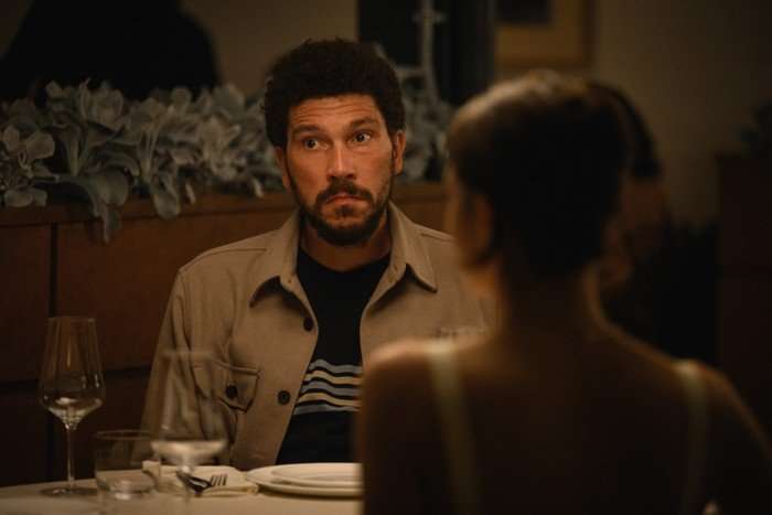 Alice and Steve Joel Fry in Alice and Steve, sat at a dinner table.