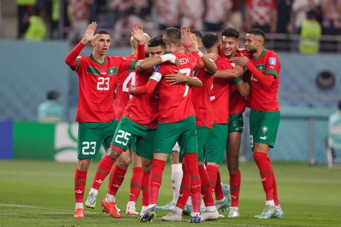 Morocco players celebrate scoring a goal against Croatia at the World Cup 2022 in Qatar