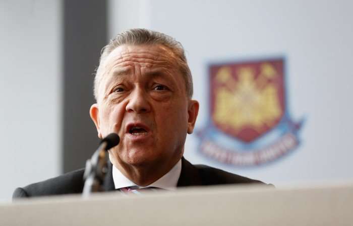 Announcement on future of the Olympic Stadium David Sullivan stood in front of a podium speaking into a microphone.