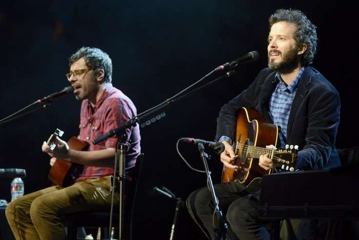 MOUNTAIN VIEW, CA - SEPTEMBER 20: Jemaine Clement (L) and Bret McKenzie of Flight of the Conchords perform as part of the The Oddball Comedy & Curiosity Festival at Shoreline Amphitheatre on September 20, 2013 in Mountain View, California. (Photo by Tim Mosenfelder/Getty Images)Getty, TL