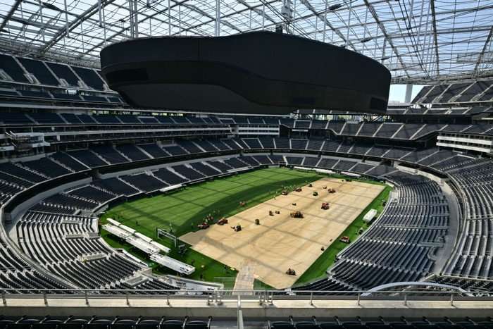 An image of the inside of Los Angeles Stadium, empty, with work underway on the pitch ahead of World Cup 2026.