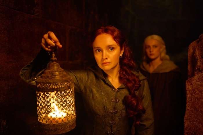 Olivia Cooke as Alicent Hightower in House of the Dragon season 3 Olivia Cooke as Alicent Hightower in House of the Dragon season 3. She's shrouded in darkness, holding a lantern ahead of her.