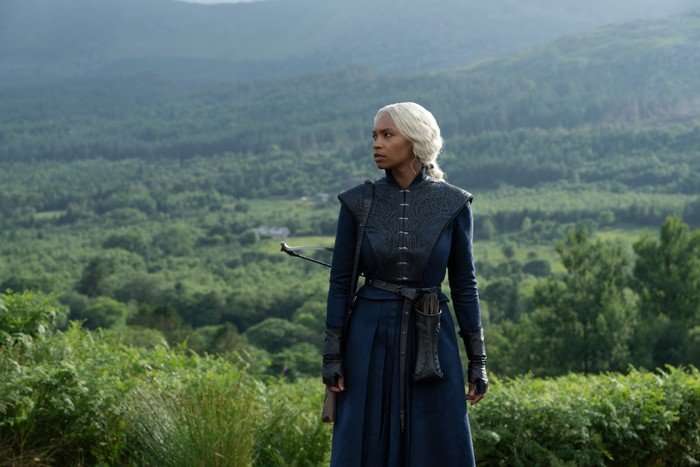 Bethany Antonia as Lady Baela Targaryen in House of the Dragon season 3 Bethany Antonia as Lady Baela Targaryen in House of the Dragon season 3. She's standing among green fields and is looking at something off-camera.