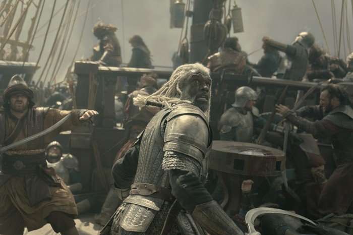 Steve Toussaint as Corlys Velaryon in House of the Dragon season 3, in the midst of battle on a ship.