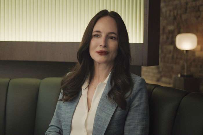 I Will Find You Madeleine Stowe as Gertrude Payne in I Will Find You sat in a dimly lit room, wearing a blue blazer, white shirt and smiling.