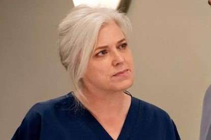 Caroline Harker as Doctor Todd in Emmerdale, wearing hospital scrubs