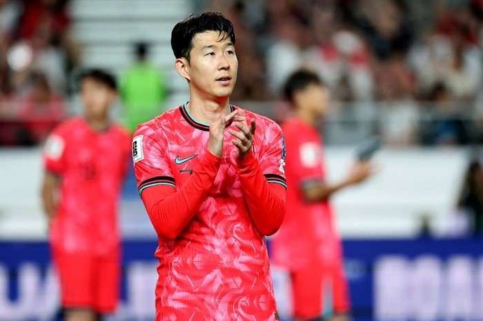 South Korea v Kuwait - FIFA World Cup Asian 3rd Qualifier Son in red South Korea kit clapping