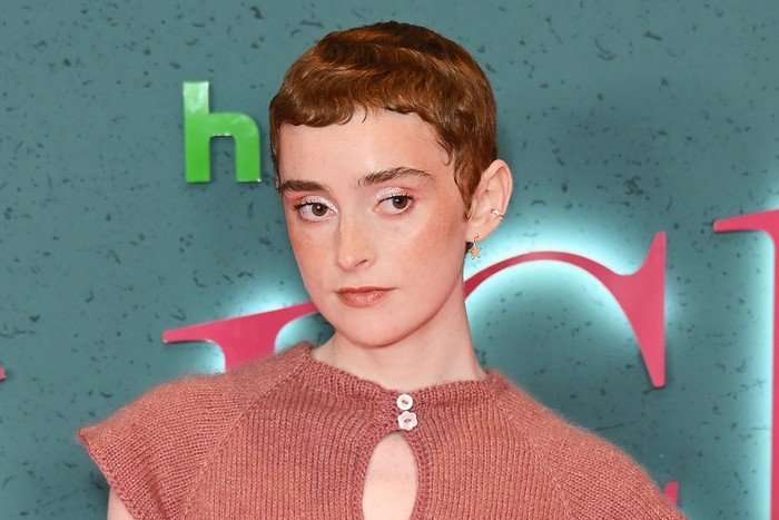 eilidh-fisher Eilidh Fisher photographed at the Alice and Steve premiere, wearing a coral coloured top and posing for cameras