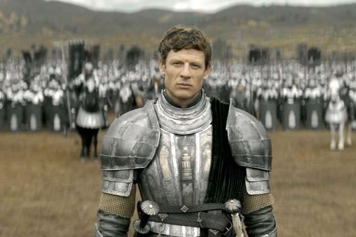 James Norton as Lord Ormund Hightower in House of the Dragon season 3, standing on a battle field in armour