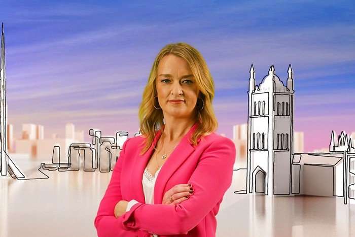Sunday with Laura Kuenssberg Laura Kuenssberg wearing a pink blazer with her arms crossed