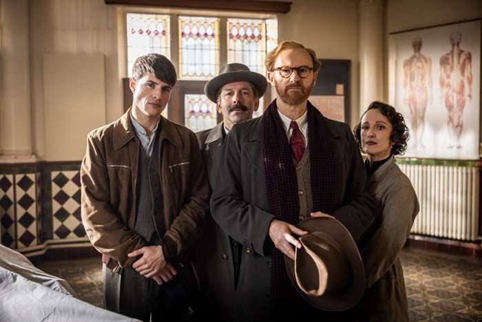 Mark Gatiss, Connor Finch, Elliot Levey and Nadia Albina in Bookish, stood together, looking at the camera.