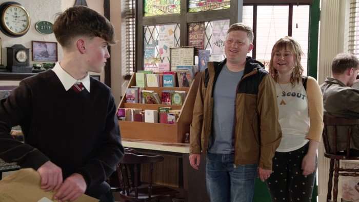 Chesney and Gemma approach Joseph in the caff in Coronation Street