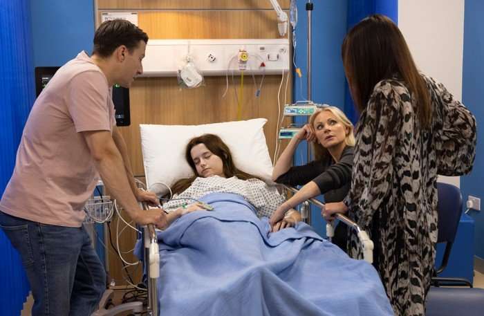15_07_CORO_HOSPITAL_01 Ryan, Carla and Lisa keep vigil around Betsy's hospital bed in Coronation Street