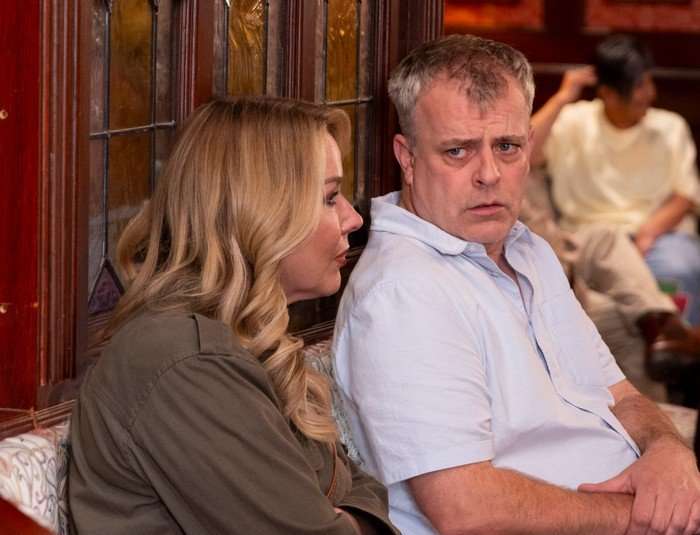 Cassie and Steve in a Rovers booth in Coronation Street