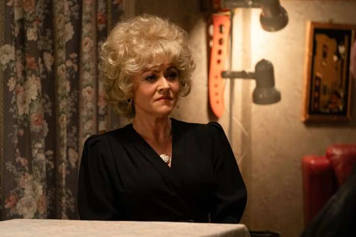 Jaime Winstone as Peggy Mitchell wearing black in EastEnders.
