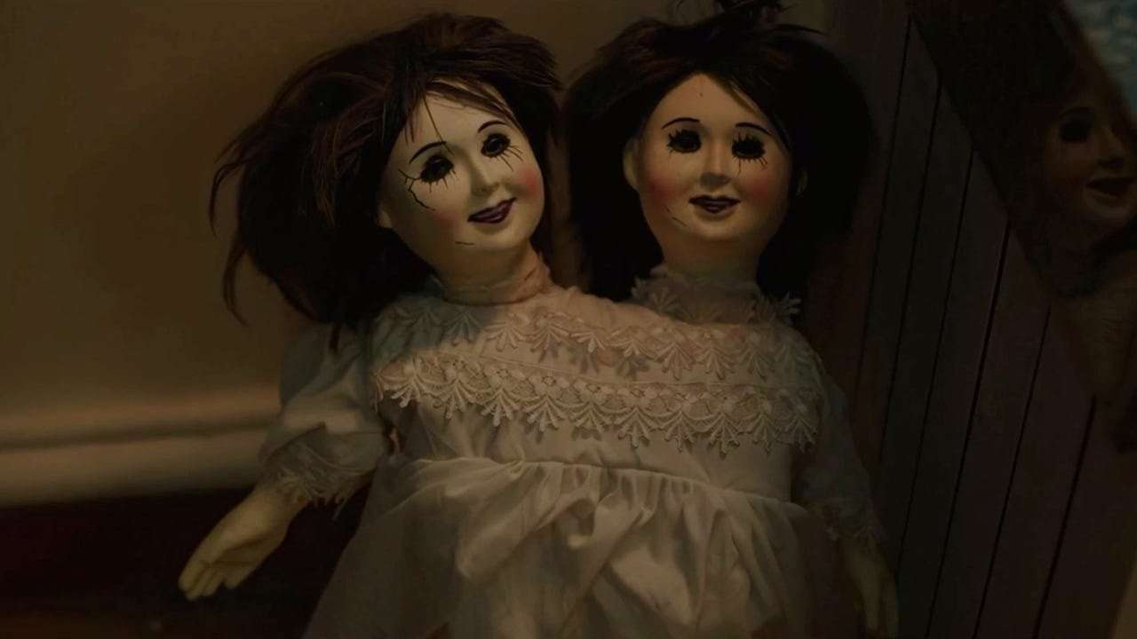 A two-headed doll unleashes terror in She Saw Us trailer